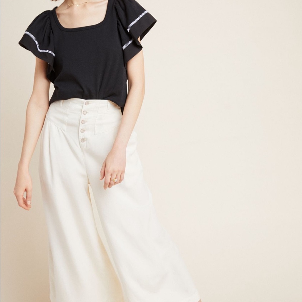 Anthropologie Black and White top with ruffle sleeve size small